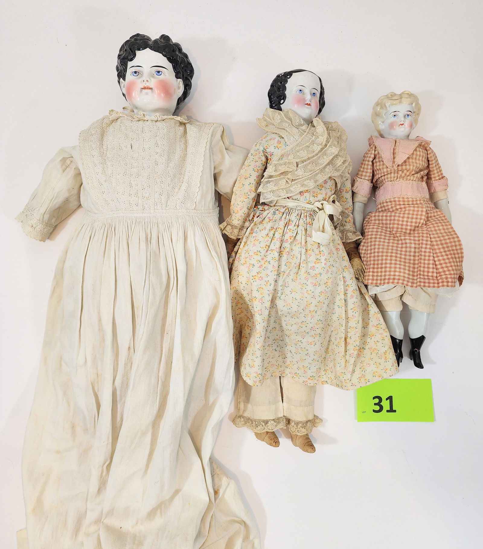 THREE CHINA-HEAD DOLLS (1 of 5)