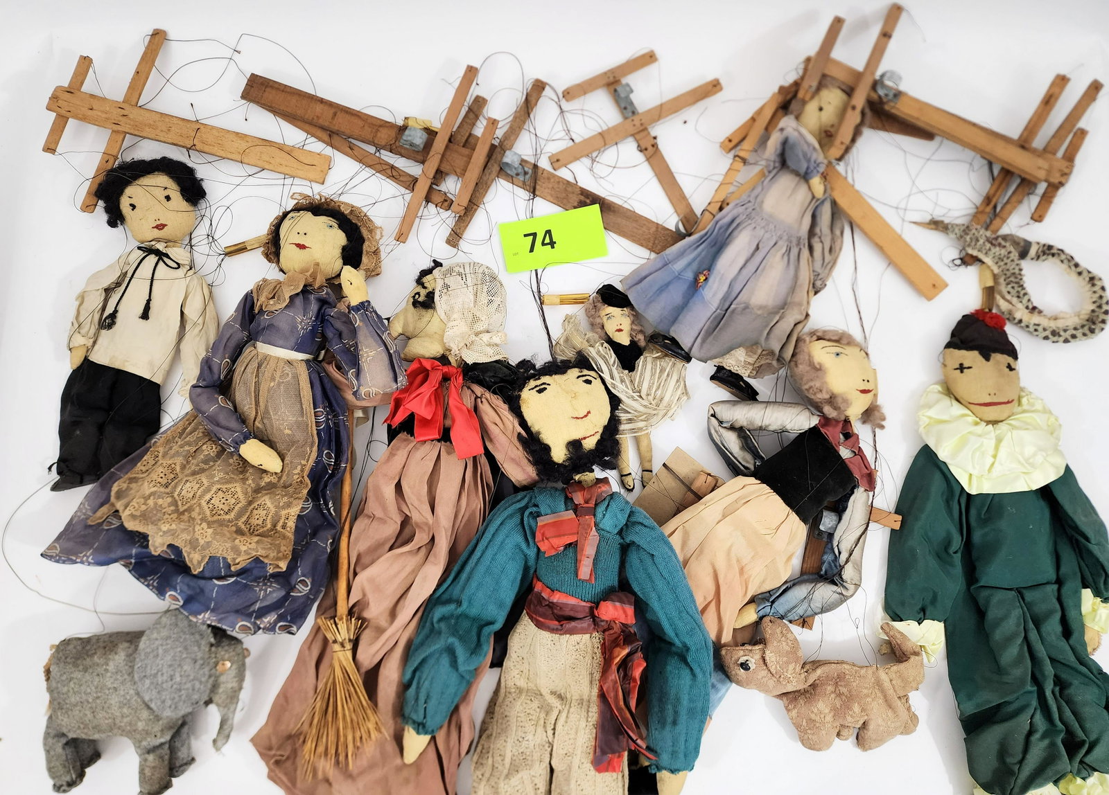 COLLECTION OF MARIONETTE DOLLS: Eight people, a dog, a snake, and an elephant. One appears to be Judy of Punch and Judy. Judy is 21" high.