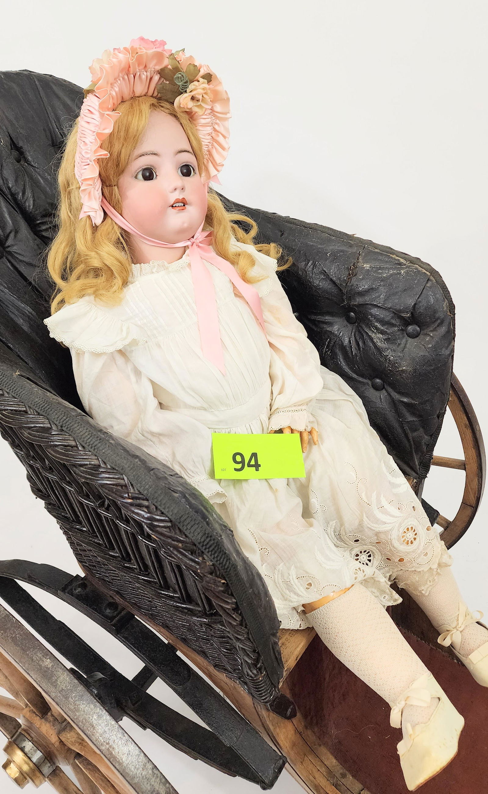 34" SIMON-HALBIG/HEINRICH HANDWERCK DOLL: Bisque head and composition body, sleepy eyes, open mouth with teeth, pierced ears, blonde, in white gown with lace openwork trim. 34" high.