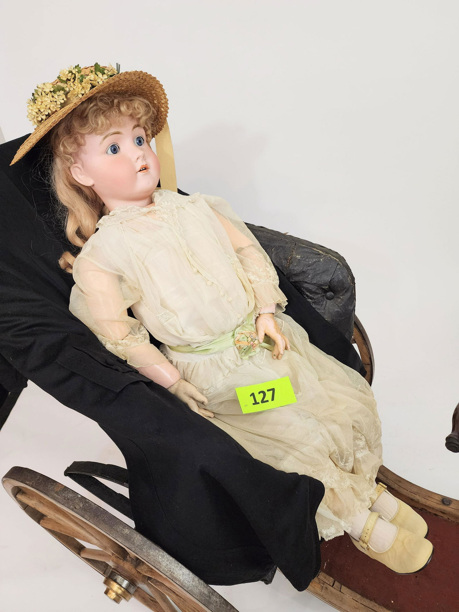42" WALKURE BISQUE-HEAD DOLL: Bisque head and composition body, open mouth with teeth, blonde curly hair, in white shift with gauze gown and straw hat. 42" high.