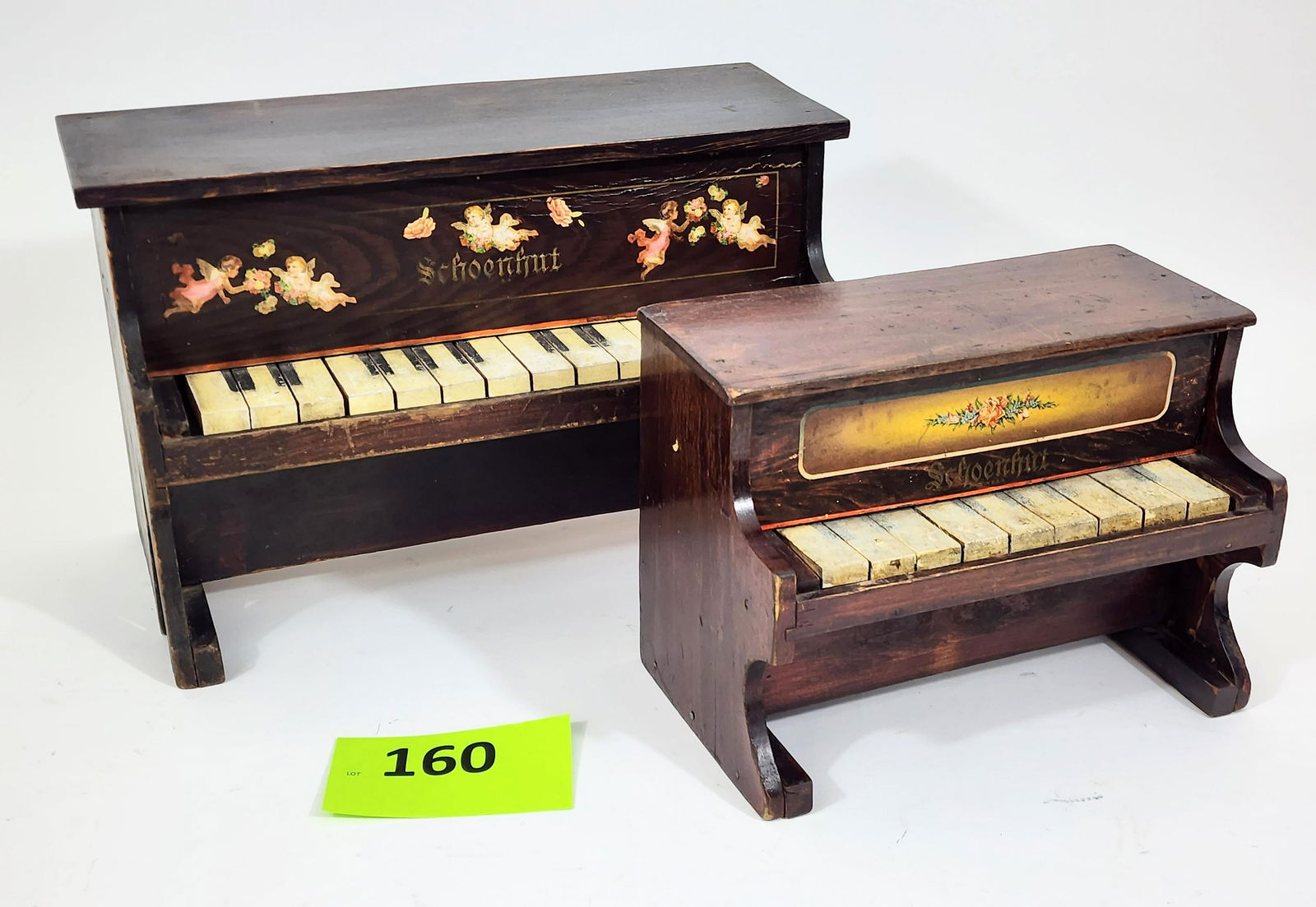 TWO SCHOENHUT TOY PIANOS (1 of 4)