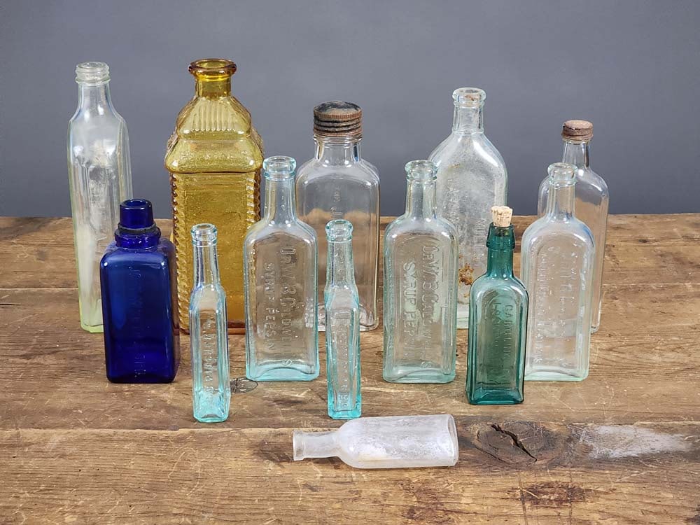 COLLECTION OF EARLY BOTTLES (1 of 7)