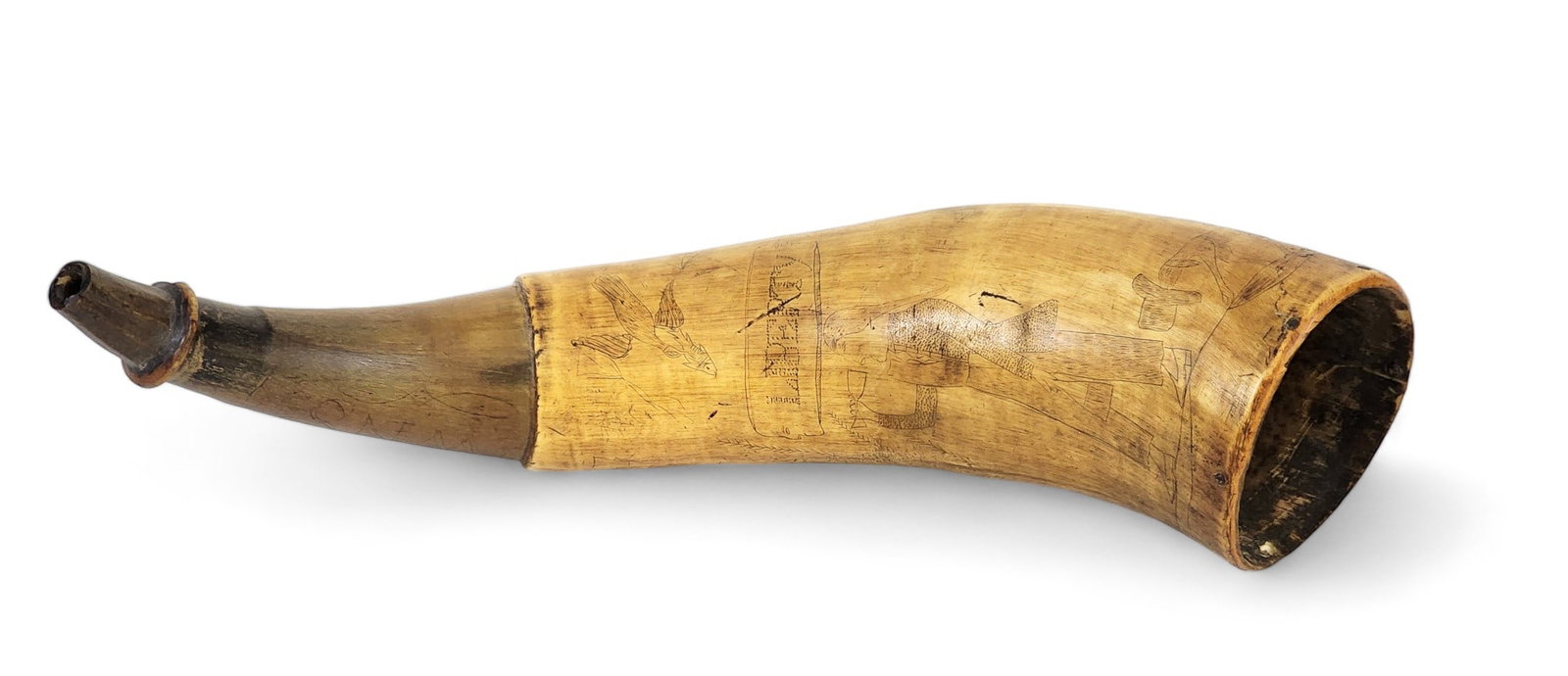 ENGRAVED POWDER HORN WITH MERMAID: American, c. 1830. Initialed "WNS" and inscribed "Jackson and Liberty" near the tip, and with elaborate decoration including a mermaid, ships, a man drinking wine (followed by his dog carrying his hat