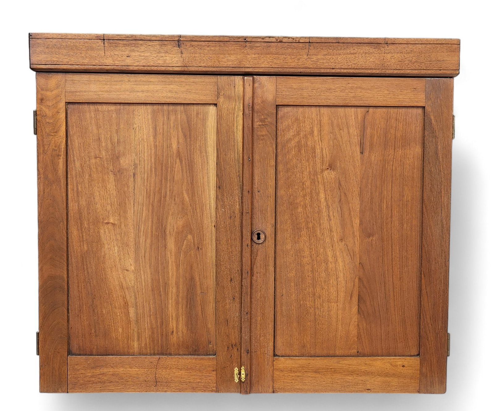 BOOKCASE TOP: American, late 19th century, walnut and poplar. Paneled doors and an interior with slots and cubbies. 29.5" high, 34.5" wide, 11.5" deep.