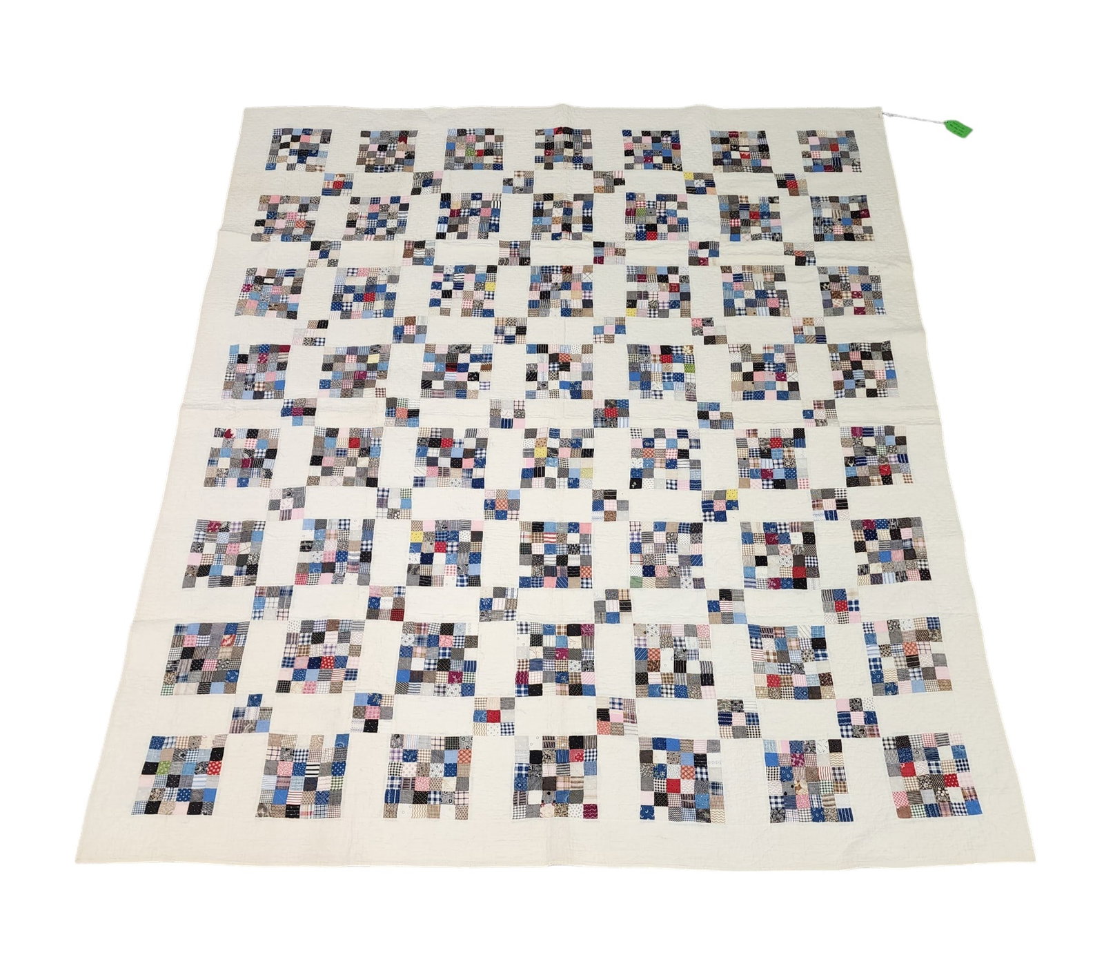 36-PATCH PIECED QUILT: American, 1930s, cotton. Lightweight, mostly printed fabrics. 77" by 66".