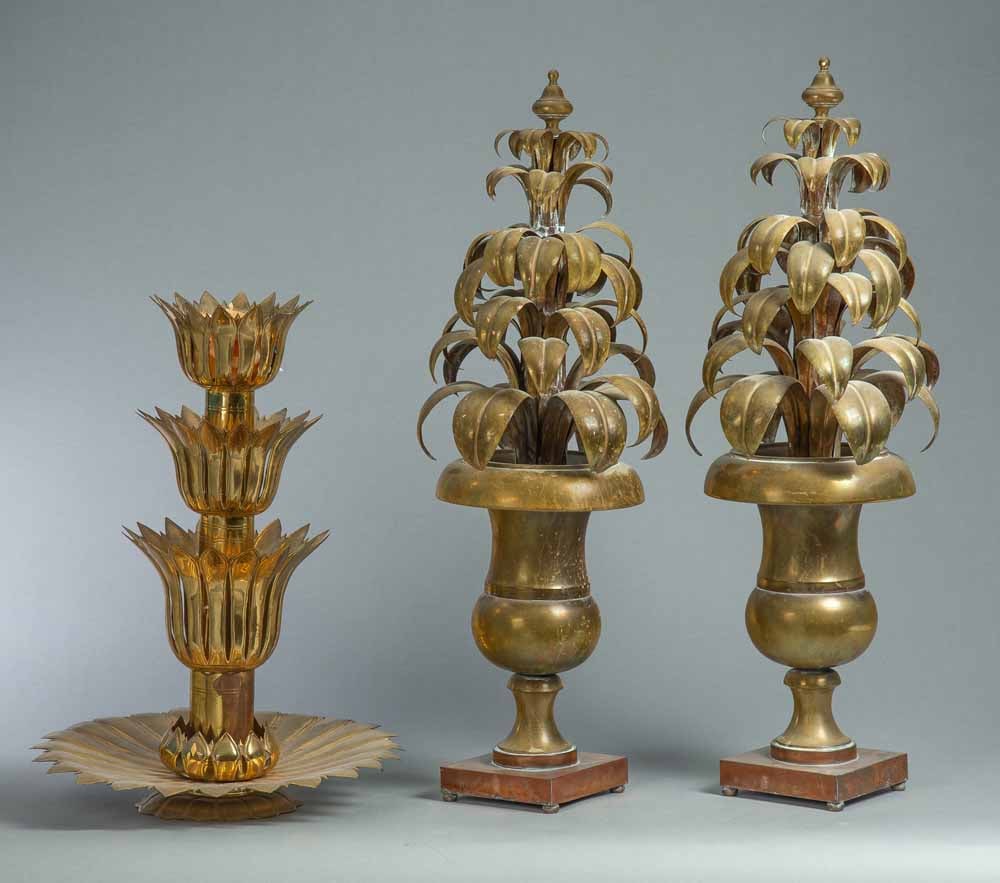 GROUP OF LARGE BRASS ITEMS: 20th century. Includes a pair of large garnitures and a centerpiece. 24"-35"h.; together with a candleabra, kindling box and a music sheet stand. 16"-31"h.