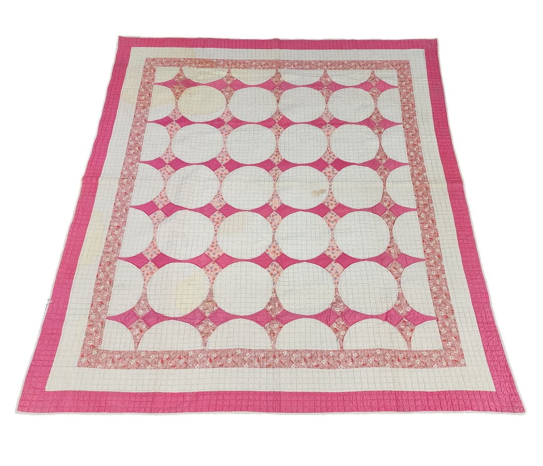 PIECED QUILT: American, c. 1940. Snowball variation. 86" by 75".