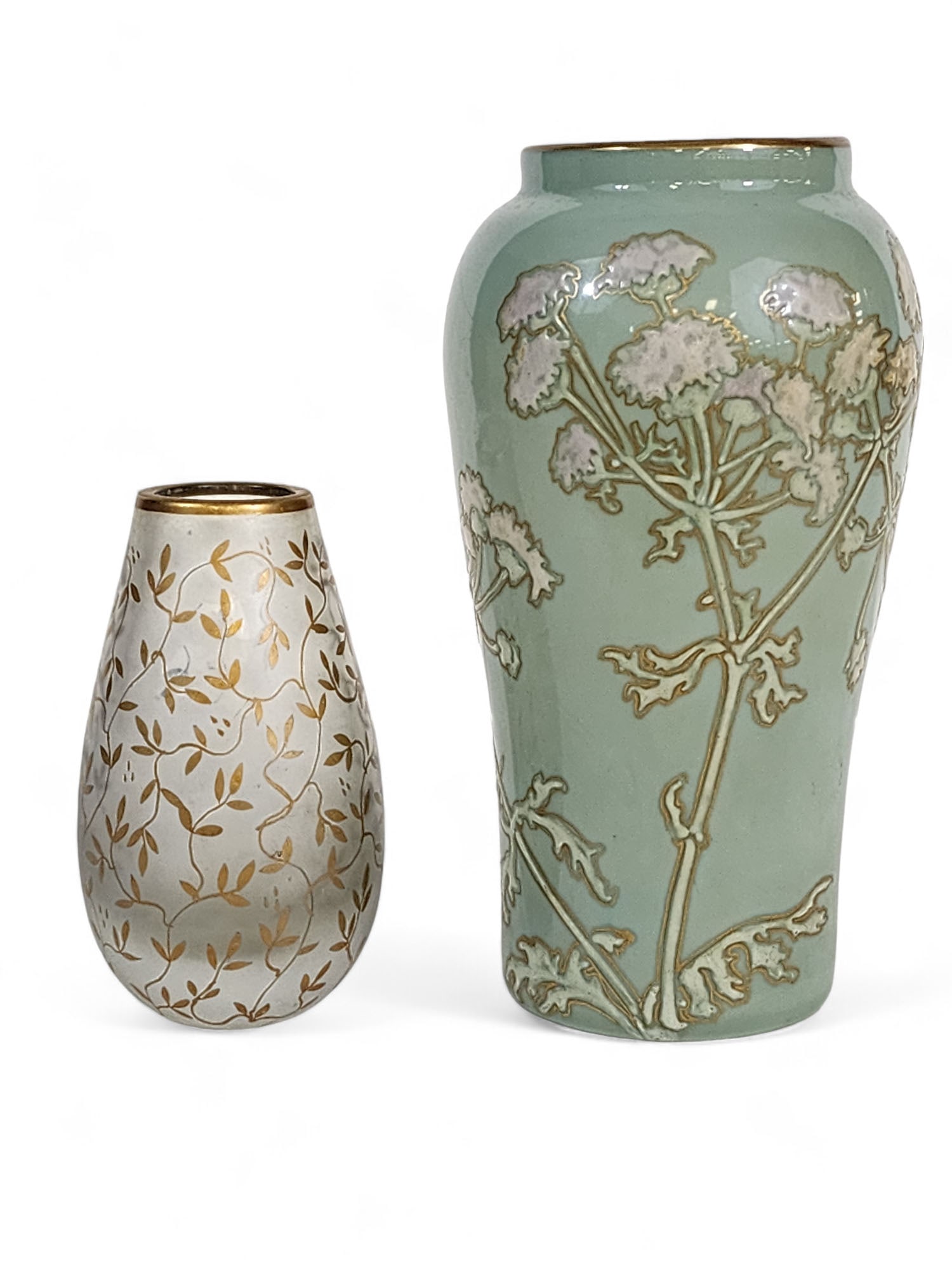 TWO PIECES ENAMELED ART GLASS: European, late 19th-early 20th century. Celadon green vase with enameled flowers, probably Thomas Webb, unsigned. 6.25" high. Small frosted glass vase with gold enamel vines and leaves. Marked "Boda"