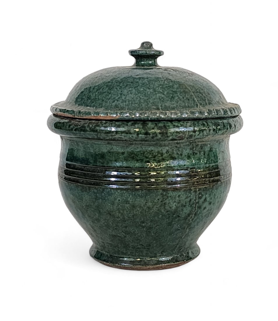 ISAAC STAHL REDWARE COVERED SUGAR BOWL.: Lehigh County, Pennsylvania, ca. 1940. Green glazed covered sugar bowl. Signed "Made by I.S. Stahl, 1940". 5.5"h. 4.5"dia.