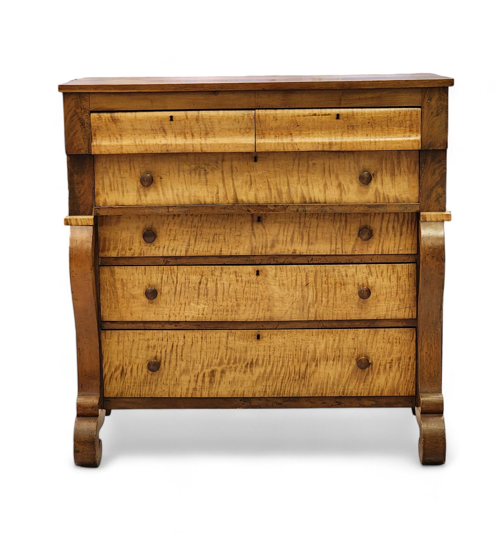 OHIO CLASSICAL CHEST OF DRAWERS: 1830-1850, curly maple, cherry, and poplar. Two over four graduated, curly maple drawers, flanked by scrolled stiles and feet. 43.75" high, 43" wide, 21.5" deep.
