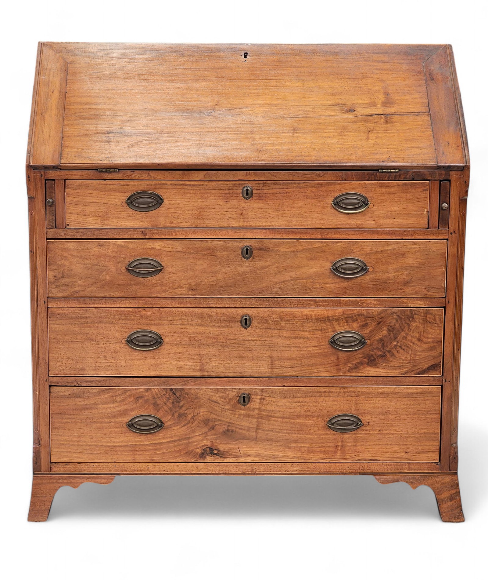 INLAID HEPPLEWHITE SLANT-FRONT DESK: Pennsylvania, 1800-1815, walnut and poplar. Dovetailed case with four graduated drawers flanked by inlaid stiles, with drawers, cubbies, and a central prospect, all on French feet. 44.5" high, 40" wid