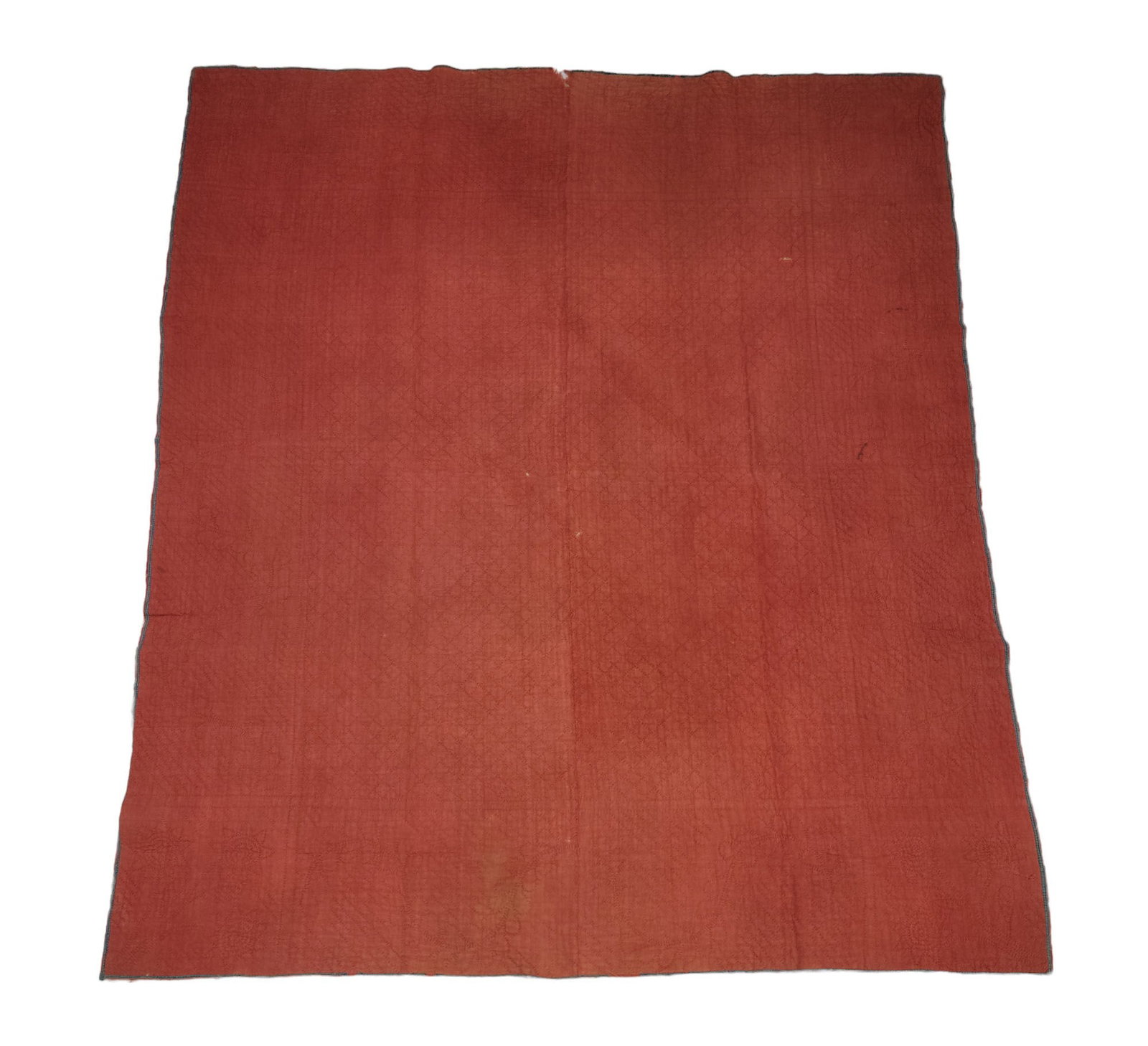WHOLE-CLOTH LINSEY WOOLSEY QUILT: American, 1st half-19th century. Red whole-cloth, with elaborate quilting. 84.5" by 71.5".