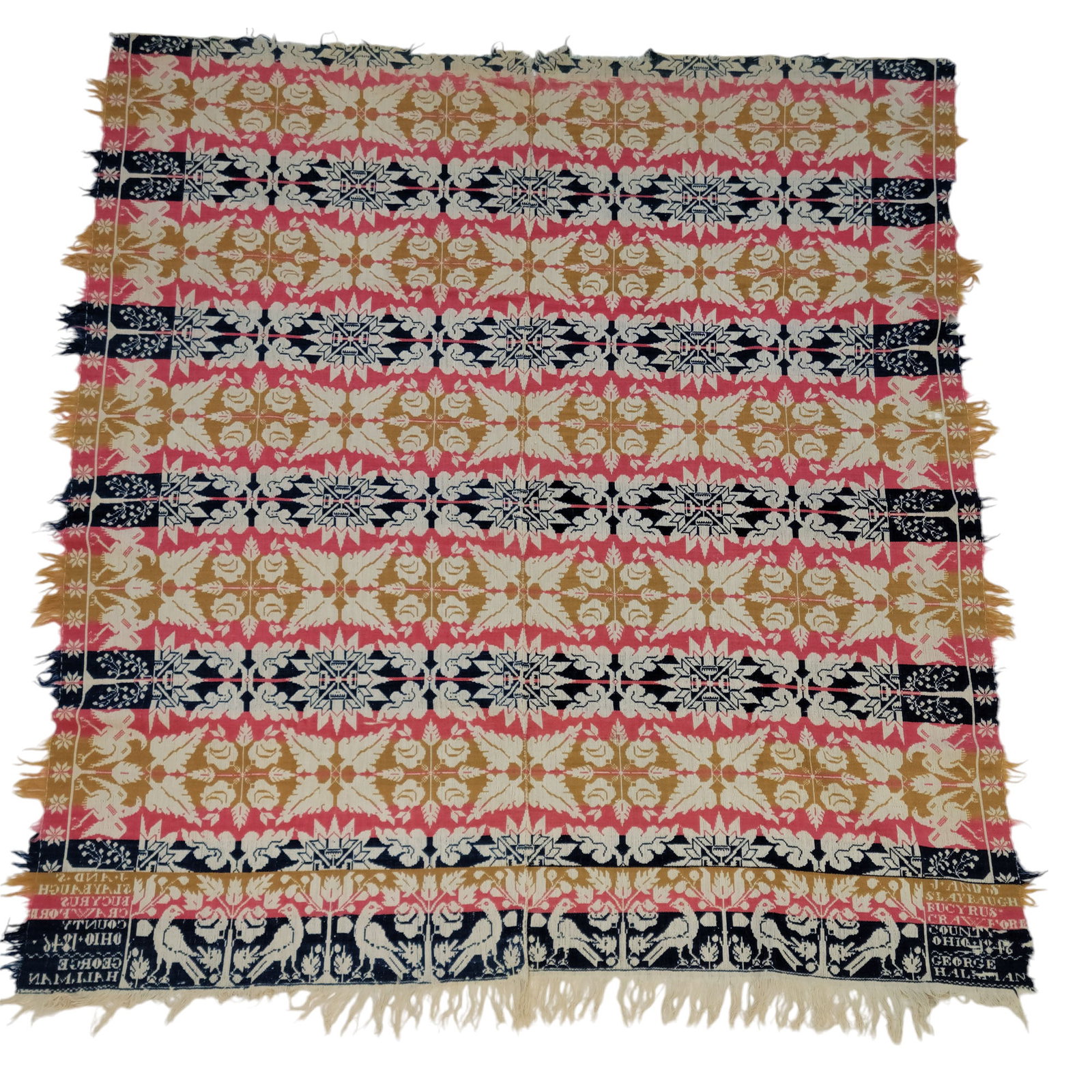 BUCYRUS, OHIO COVERLET: Josiah and Samuel Slaybaugh, Crawford County, 1846, for George Hallman. Blue, red, ochre, and white, with medallions, and a border with trees and eagles. 84" by 74".