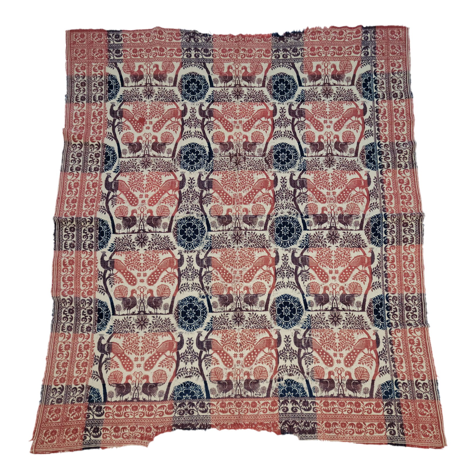JACQUARD COVERLET: Probably Ohio, mid-19th century. Blue, dark red, medium red, and white, with turkeys and peacocks. 87" by 72". Nearly identical peacocks appear on coverlets by Daniel Bury, but peacocks are known else