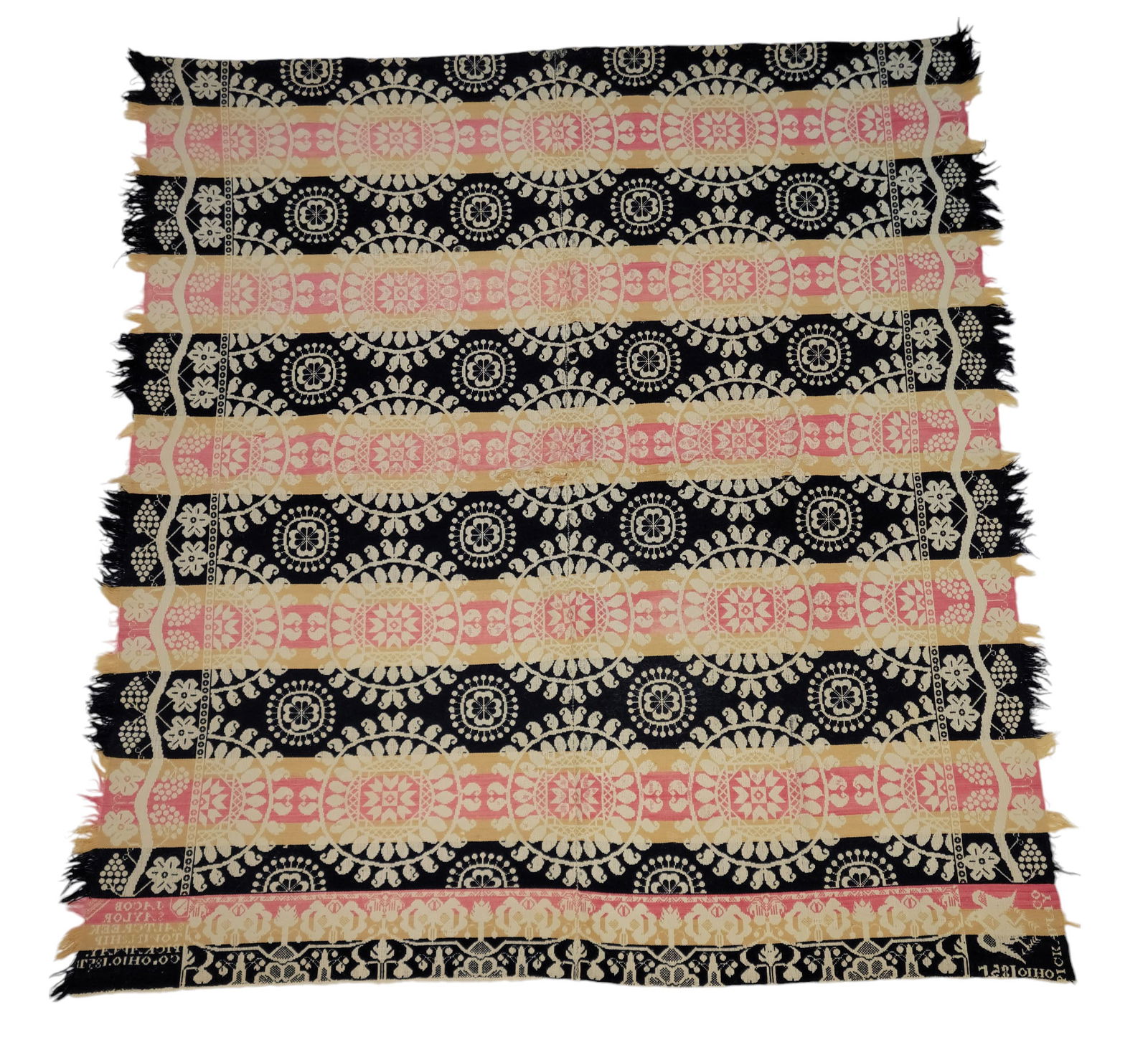 PICKAWAY COUNTY, OHIO COVERLET: Jacob Saylor, Salt Creek Township, 1857. Black, light red, yellow, and white, with medallions, and with a grape border. 80" by 73". Saylor also worked in Knox and Stark Counties.