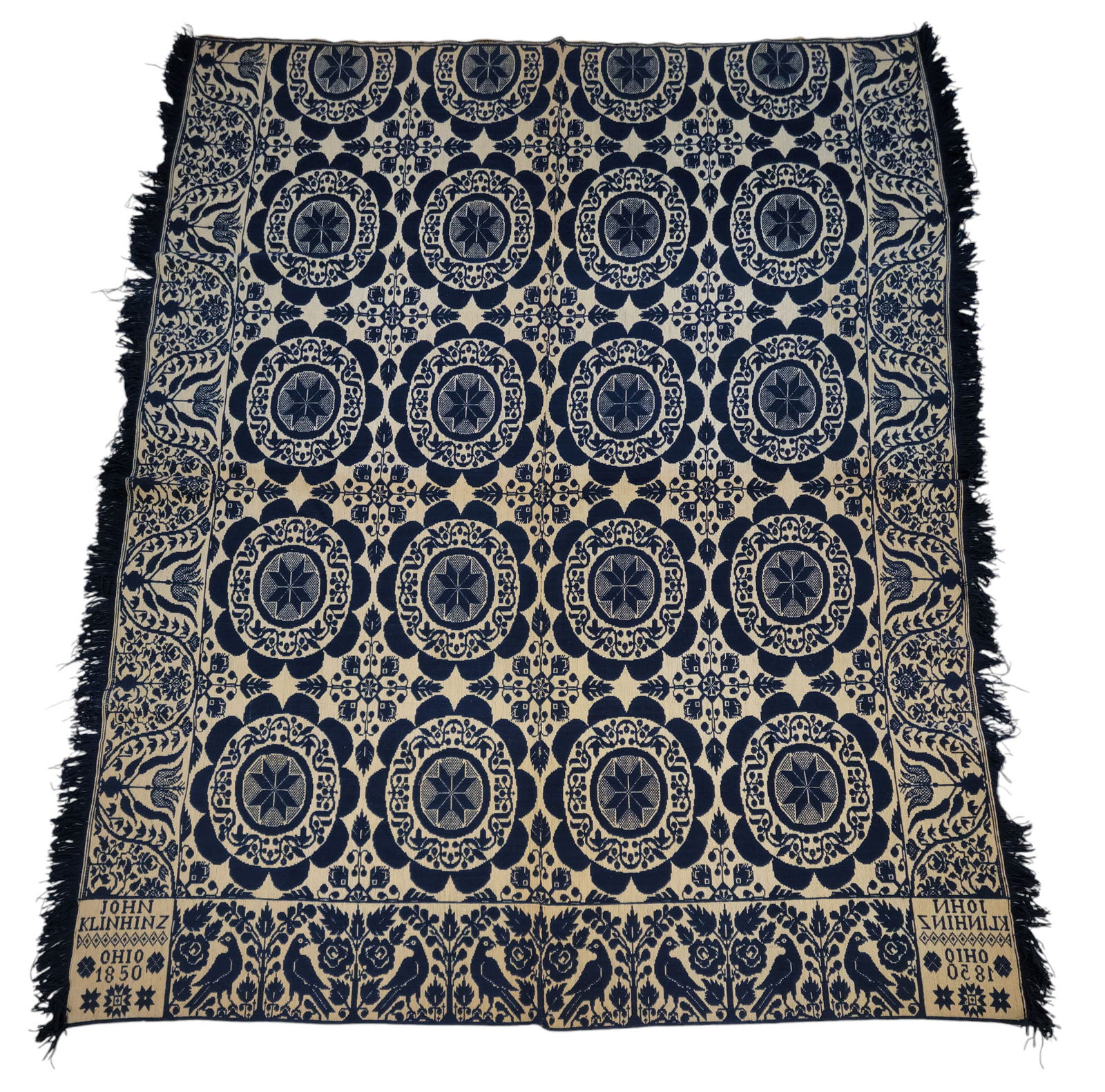 OTTAWA COUNTY, OHIO COVERLET: John Klinhinz (Klinhouse), Erie Township, 1850. Blue and white, with medallions, and borders with flowers and birds. 88" by 74".