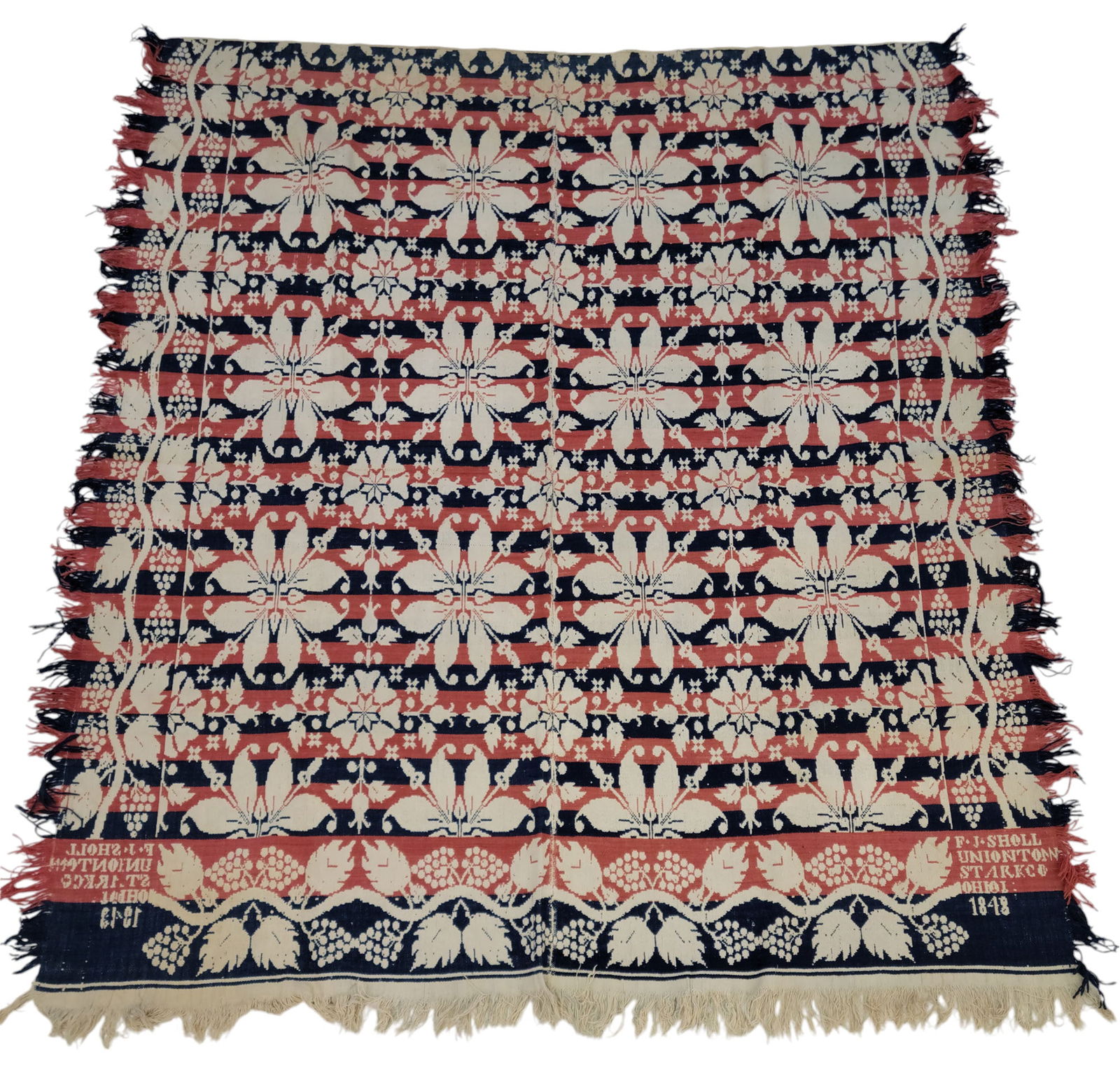 UNIONTOWN , OHIO COVERLET: Francis J. Sholl, Stark County, 1848. Blue and coral floral pattern with a grapevine border. 84" by 75" .