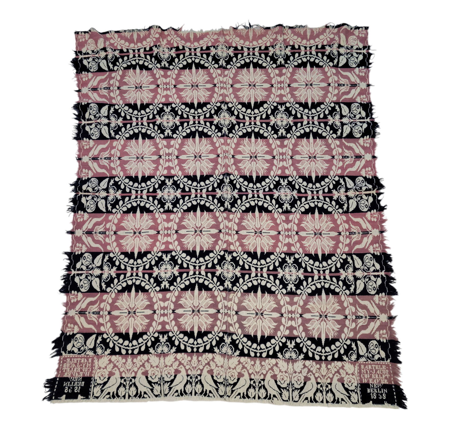 NEW BERLIN, OHIO COVERLET: New Berlin, Stark County, Ohio, 1858. Mauve and blue with centerfield of tulip medallions surrounded by wreaths, tulip side borders, bird and floral foot border, corner blocks signed and dated "BARTEL