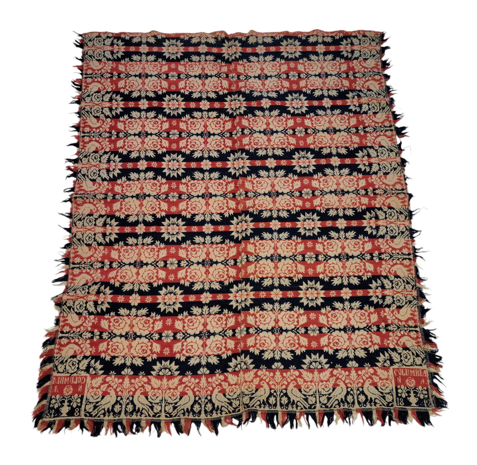 COLUMBIANA COUNTY, OHIO COVERLET: Columbiana County, Ohio, 1842. A two-piece coverlet in red, blue, and tan with rose medallion interior and borders of birds with roses and trees, corner blocks with floral urn and "COLUMBIA N A 1842",