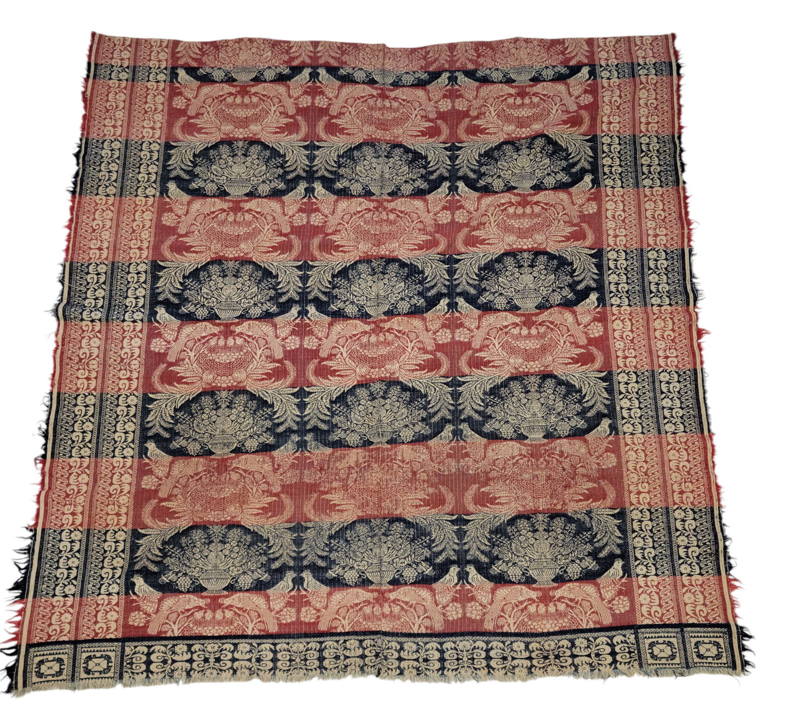 BIRDS FEEDING THEIR YOUNG COVERLET: American, mid-19th century. Red, blue, and white, with urns of flowers and nests with birds feeding their young. 80" by 76".