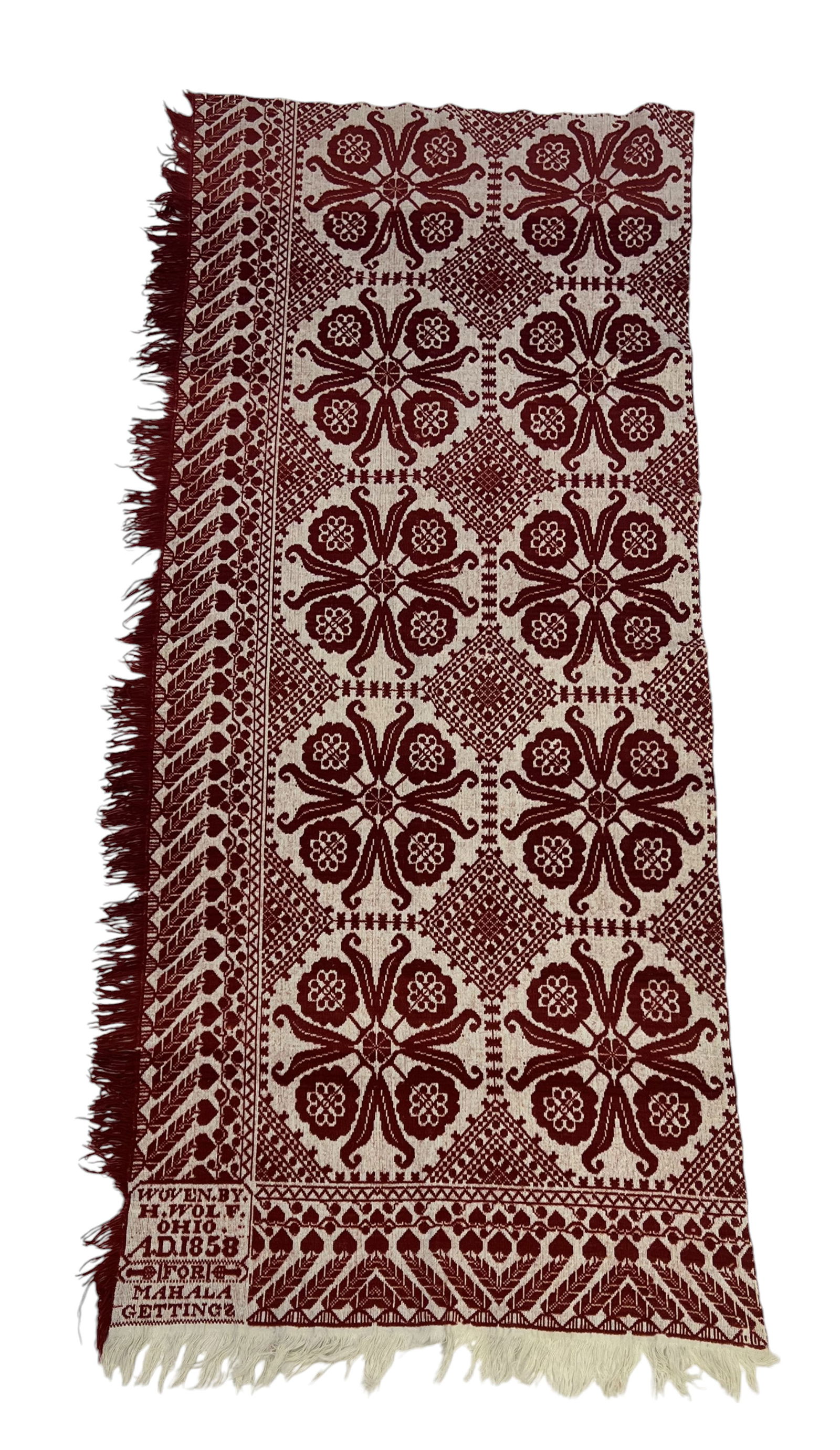 RICHLAND COUNTY, OHIO HALF COVERLET: Henry Wolf for Mahala Gettings, 1858. Red and white with unusual feather and heart border. 85" by 37".