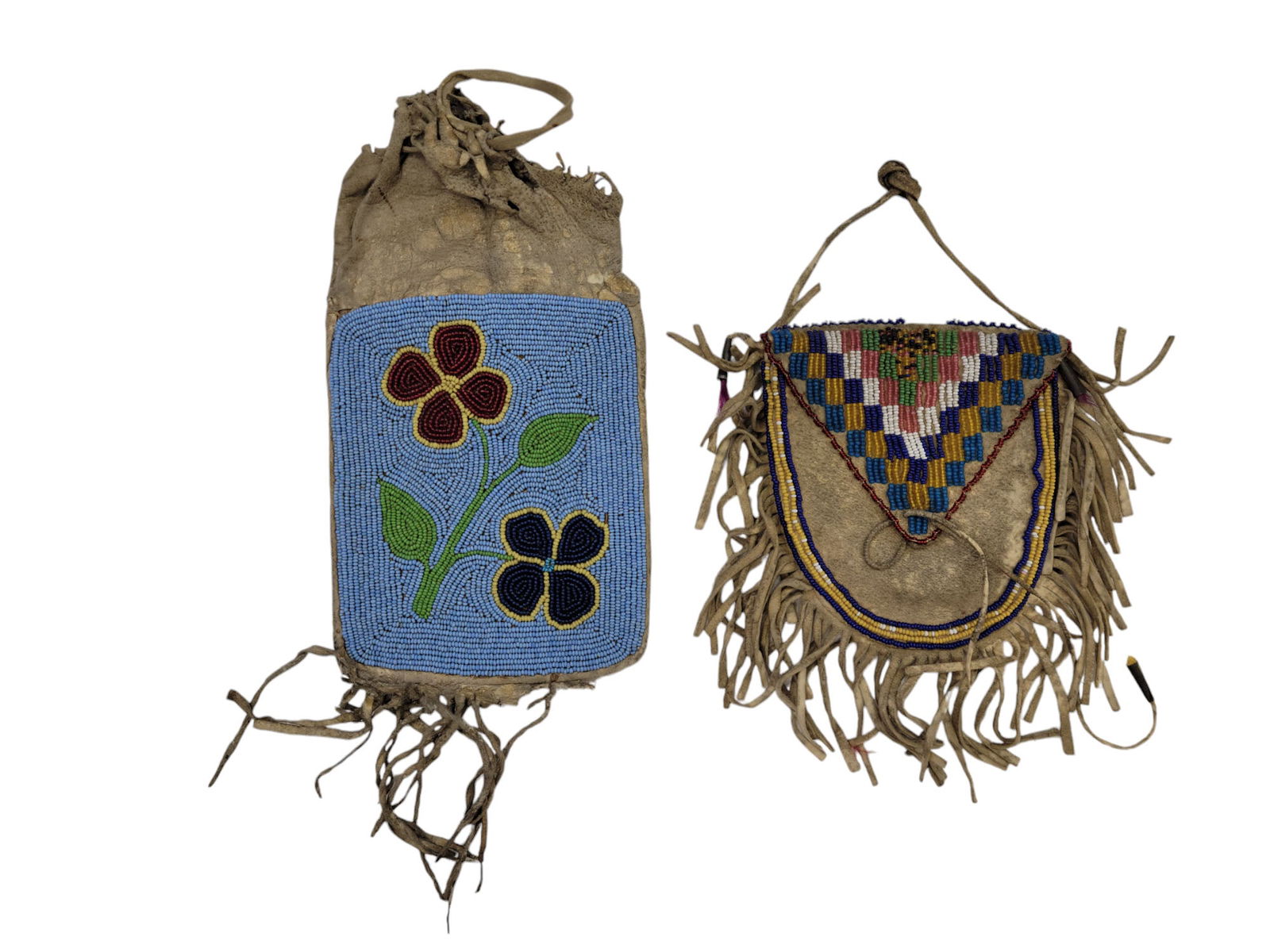 TWO PLAINS INDIAN BEADED POUCHES: Late 19th century. Largest is 8" long (excluding fringe).
