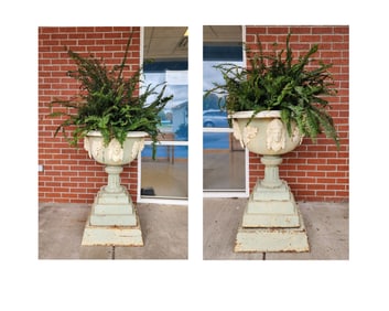 PAIR OF VICTORIAN CAST-IRON URNS