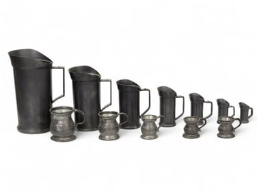 TWO GRADUATED SETS OF PEWTER MEASURES