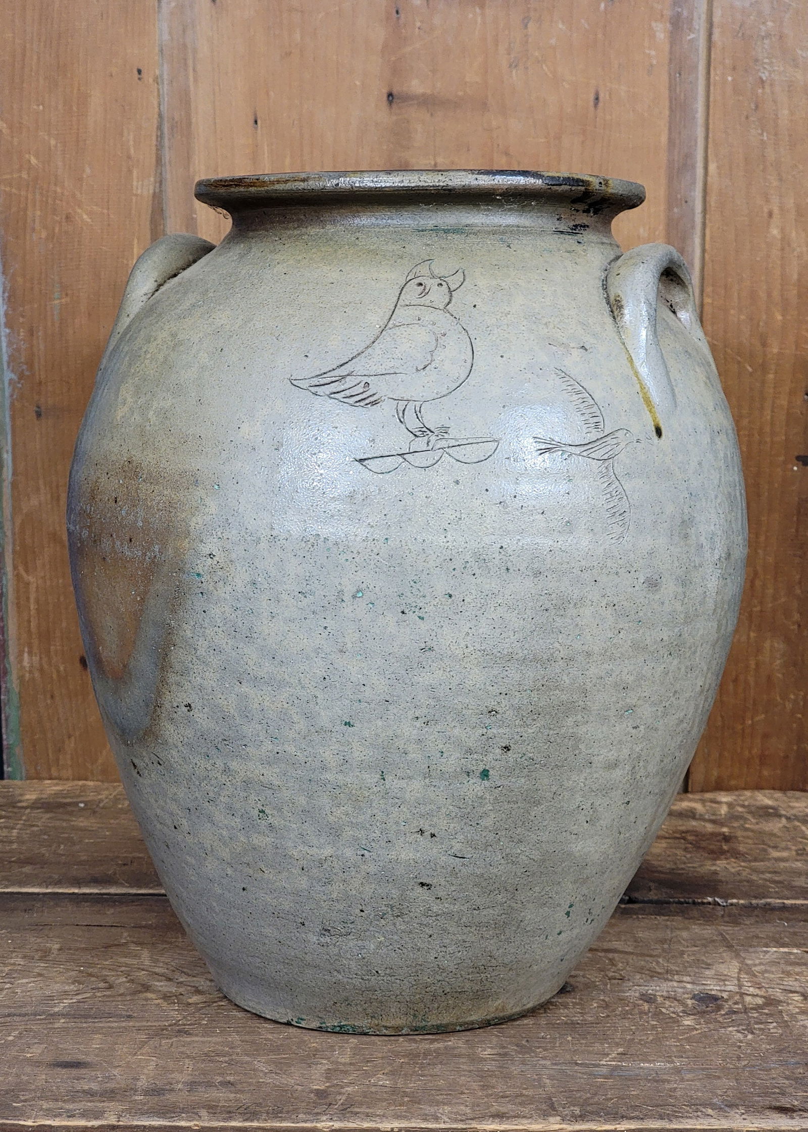 STONEWARE JAR WITH FISH AND OWL