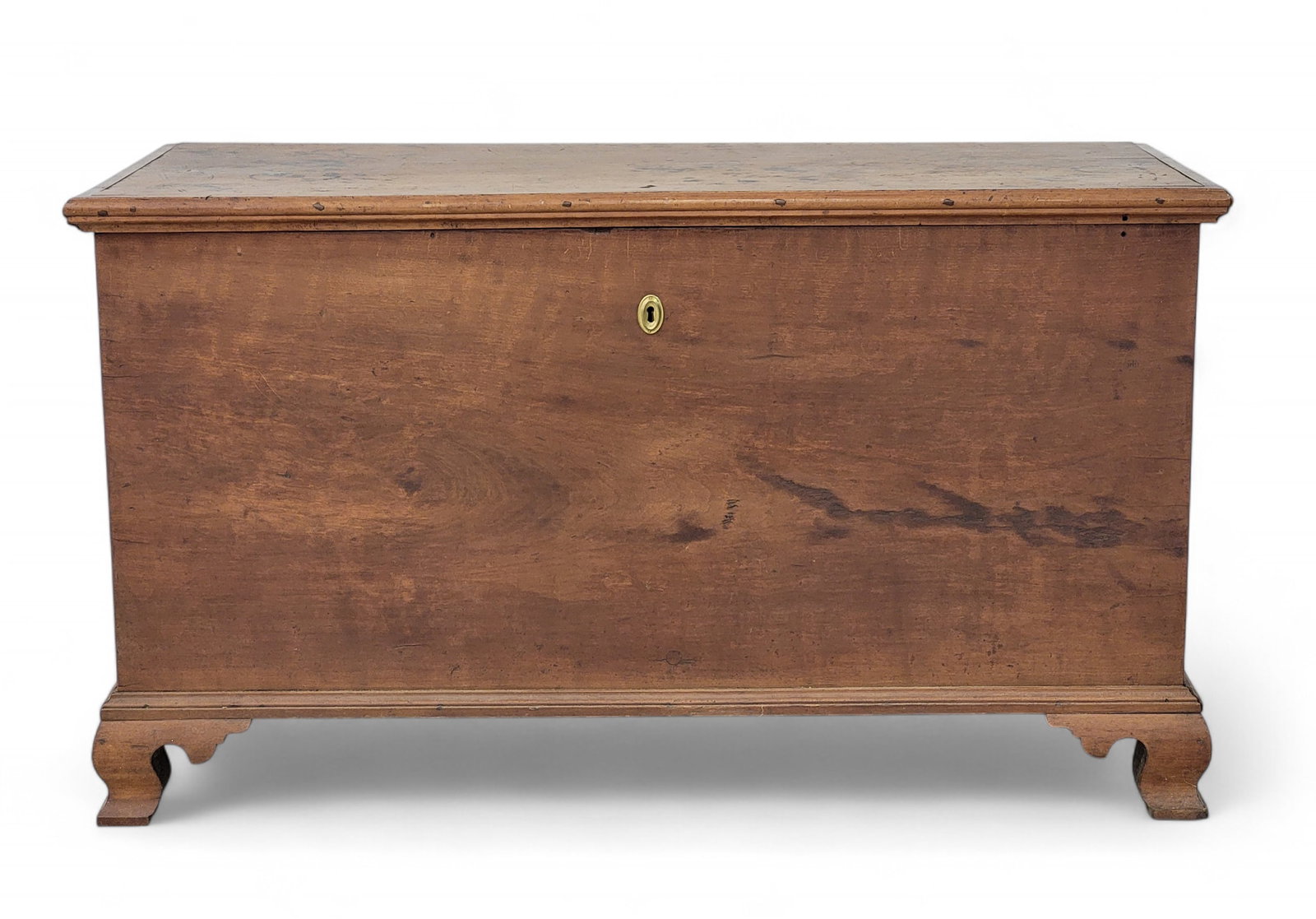 CHIPPENDALE BLANKET CHEST: Pennsylvania or Ohio, cherry and walnut, early 19th century. Dovetailed case on ogee bracket feet, interior till with two secret drawers. 29" high, 50" wide, 22" deep. Provenance: a Gallipolis, Ohio c