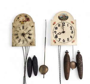 TWO MINIATURE WAG-ON-THE-WALL CLOCKS