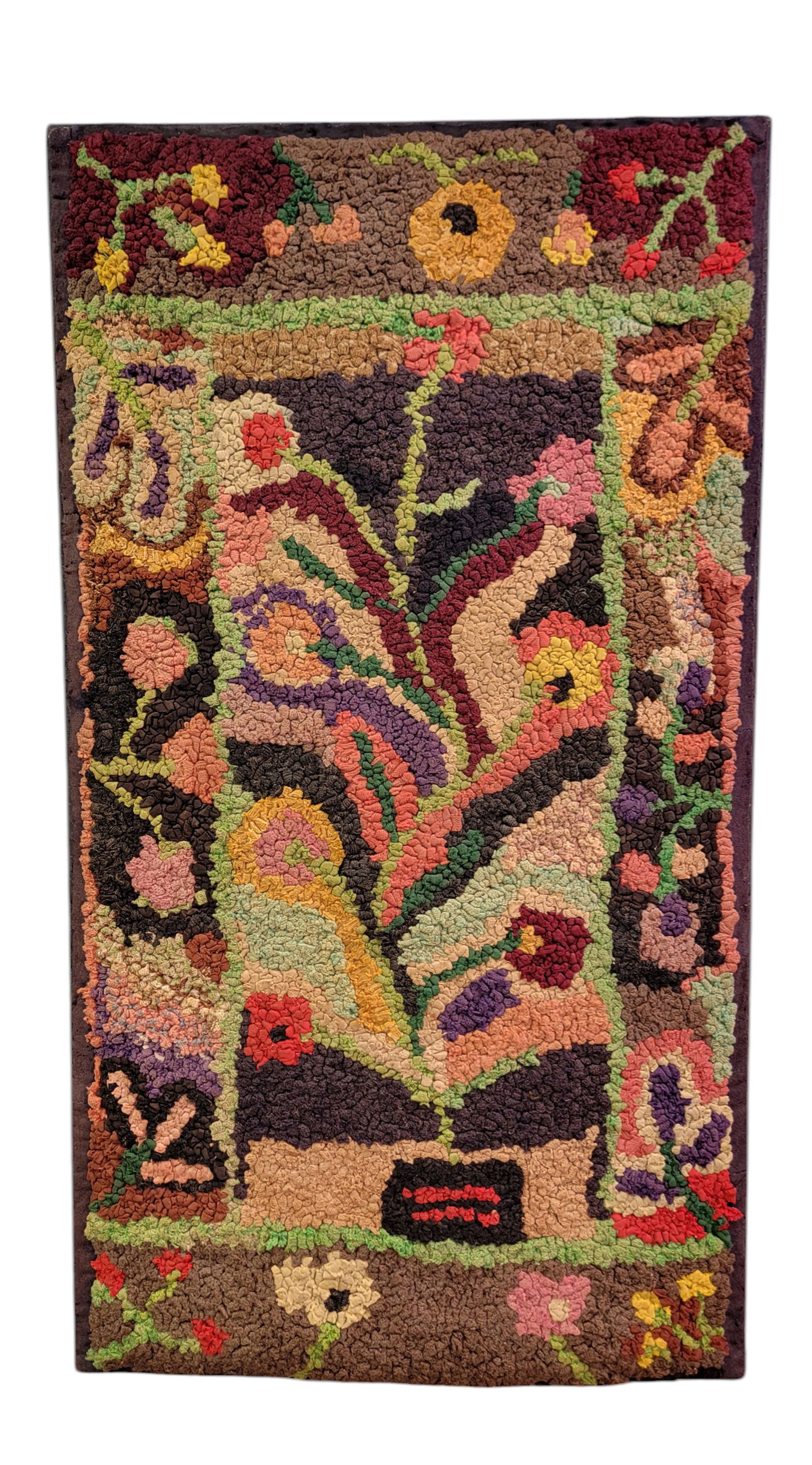FLORAL HOOKED RUG: American, 1st half-20th century. Unusual, vertically oriented rug with pot and flowers. Mounted for hanging. 50.5" high, 27.5" wide. Provenance: private collection.