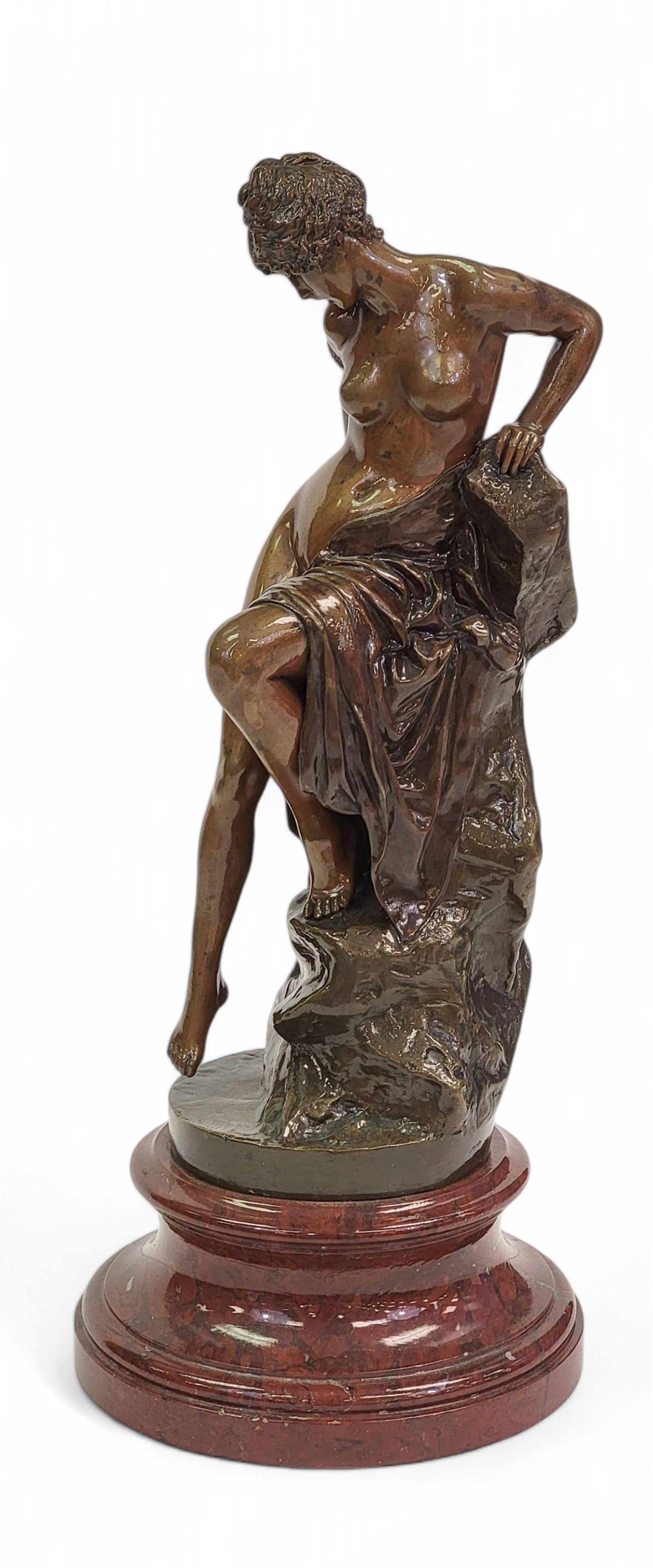 AFTER FERDINAND LEPCKE (GERMANY, 1866-1909): BRONZE NUDE: Signed in the casting and marked for the J. Kalmar Foundry, Austria. Nude woman posing on a rock. On a marble base. 15" high (overall). Provenance: From the collection of the late Pete Slates, Carroll