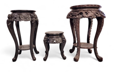 THREE CARVED PLANT STANDS