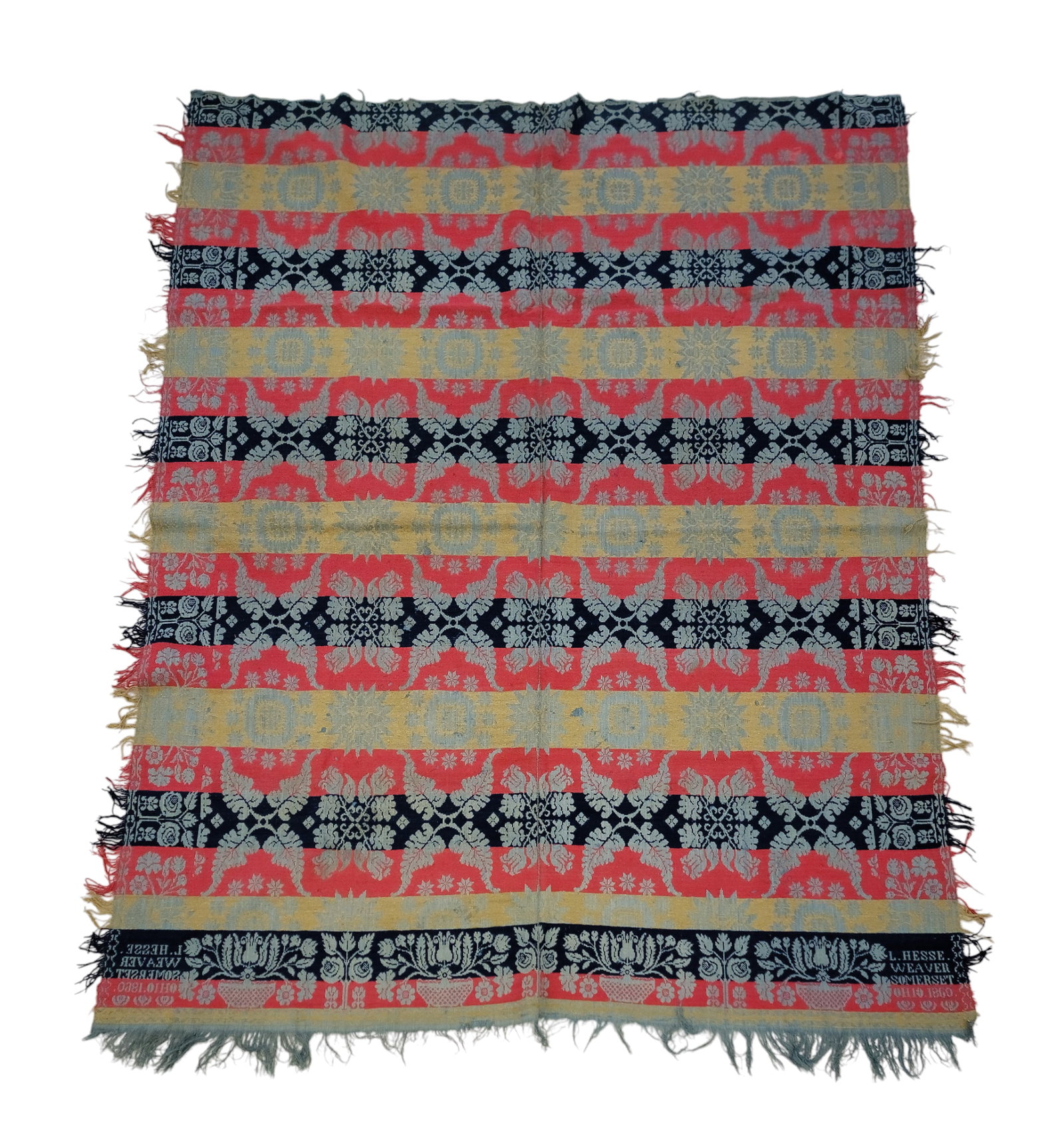 SOMERSET, OHIO COVERLET: Perry County, Ohio, 1860. A two-piece coverlet woven in green, red, and blue, flower basket and rosebush border on three sides, centerfield of tulips and fern-like leaves, corner blocks signed "L. HES