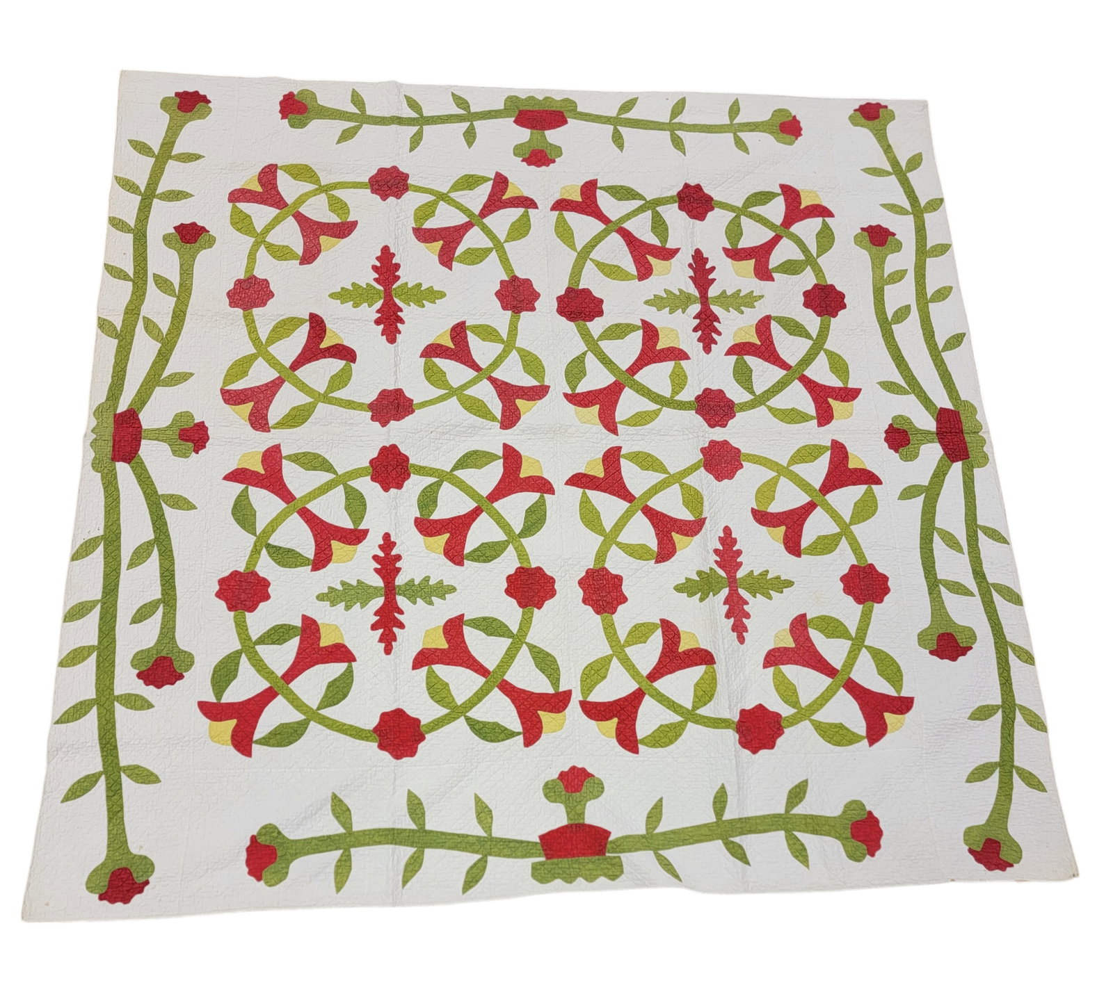 FLORAL APPLIQUE QUILT: American, mid-19th century, cotton. Four floral wreaths with borders of vining flowers in small flower pots, 86.5" square. Dr. Gunn's note with the quilt lists "Riverfront 1997". Provenance: The Dr. V