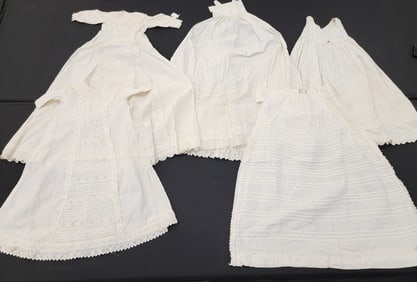 GROUP OF WHITE PLEATWORK GARMENTS