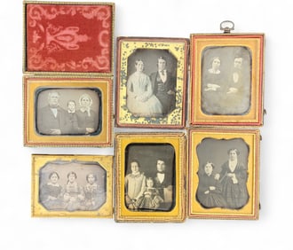 SIX QUARTER PLATE DAGUERREOTYPES OF COUPLES AND FAMILIES