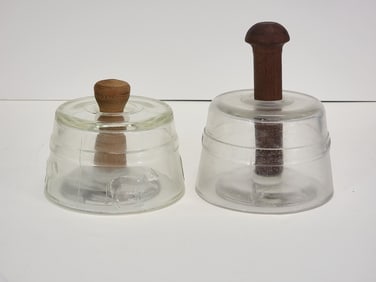 TWO UNUSUAL GLASS BUTTER MOLDS