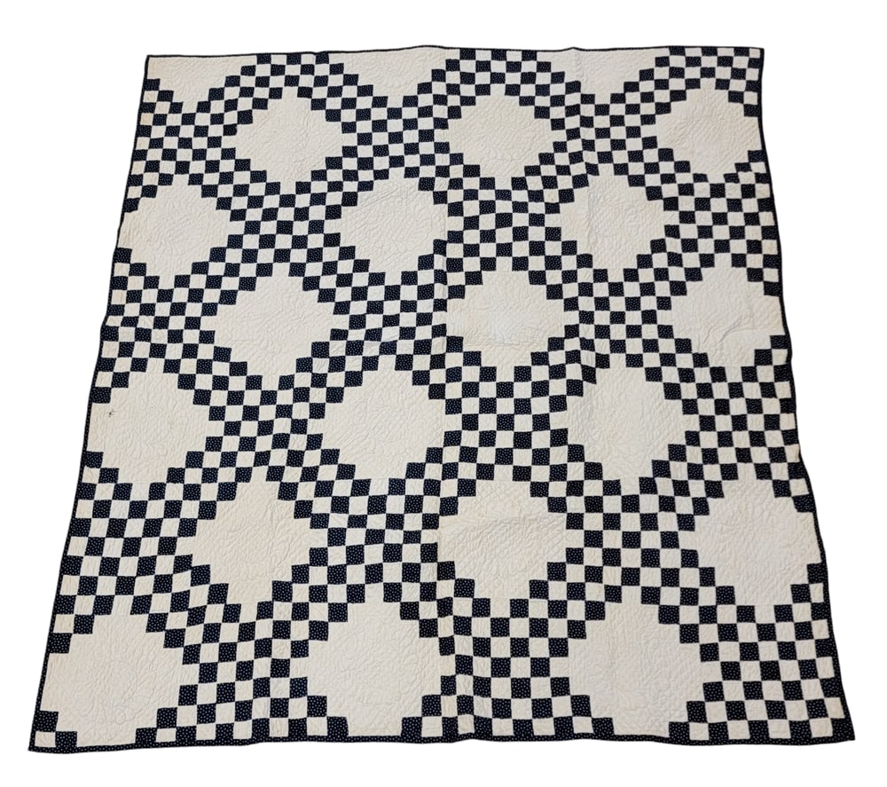 PIECED QUILT: American, late 19th. Blue checks with princess feather quilting. 82" by 75". Provenance: a Pennsylvania collection. PLEASE NOTE: YOU DO NOT HAVE TO USE LIVE AUCTIONEERS LIVE SHIPPING. WE STILL OFFER A