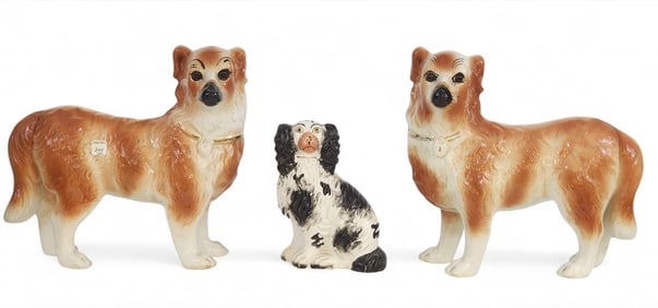 THREE STAFFORDSHIRE DOGS
