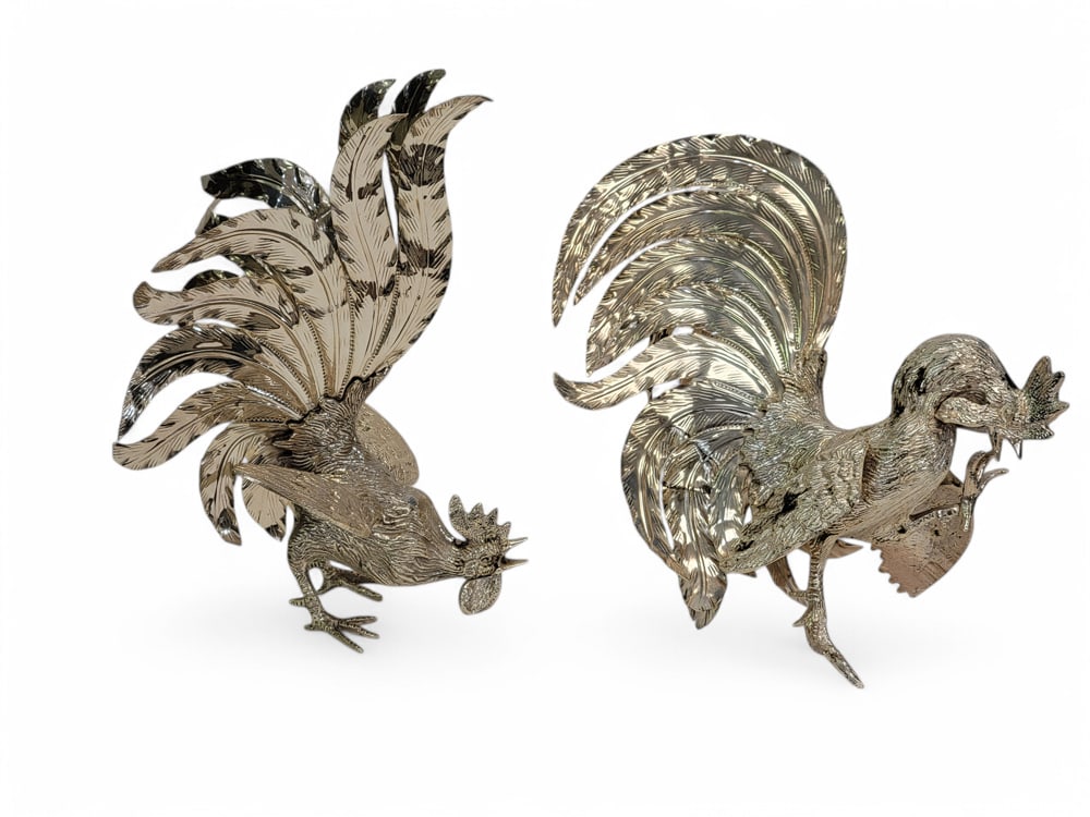 PAIR OF SILVER-PLATED TABLE ORNAMENTS: 20th century, silver plate. Fighting cocks, 14" high. Provenance: private collection. PLEASE NOTE: YOU DO NOT HAVE TO USE LIVE AUCTIONEERS LIVE SHIPPING. WE STILL OFFER AFFORDABLE IN-HOUSE SHIPPING ON