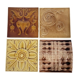 FOUR DECORATIVE TILES