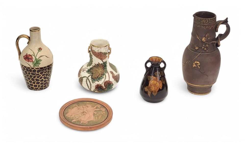 COLLECTION OF DECORATED POTTERY: 19th-20th century. Includes a handled vase with applied decoration, 8.5" high; a squat vase with floral decoration, 5" high; a bicolor stoneware vase with handpainted flowers, 6.5" high; a two-handled