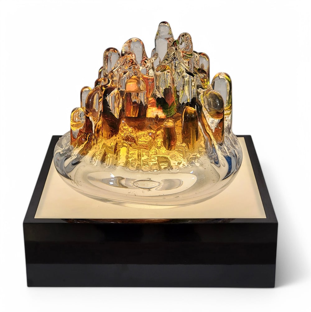 LIGHTED "POLAR" GLASS SCULPTURE: Goran Warff (b. 1933) for Kosta Art Glass, Sweden. Multicolor and clear glass, and on a lighted base. 9.5" high (sculpture); 4" high, 14" square (base only). Provenance: private collection. Although u