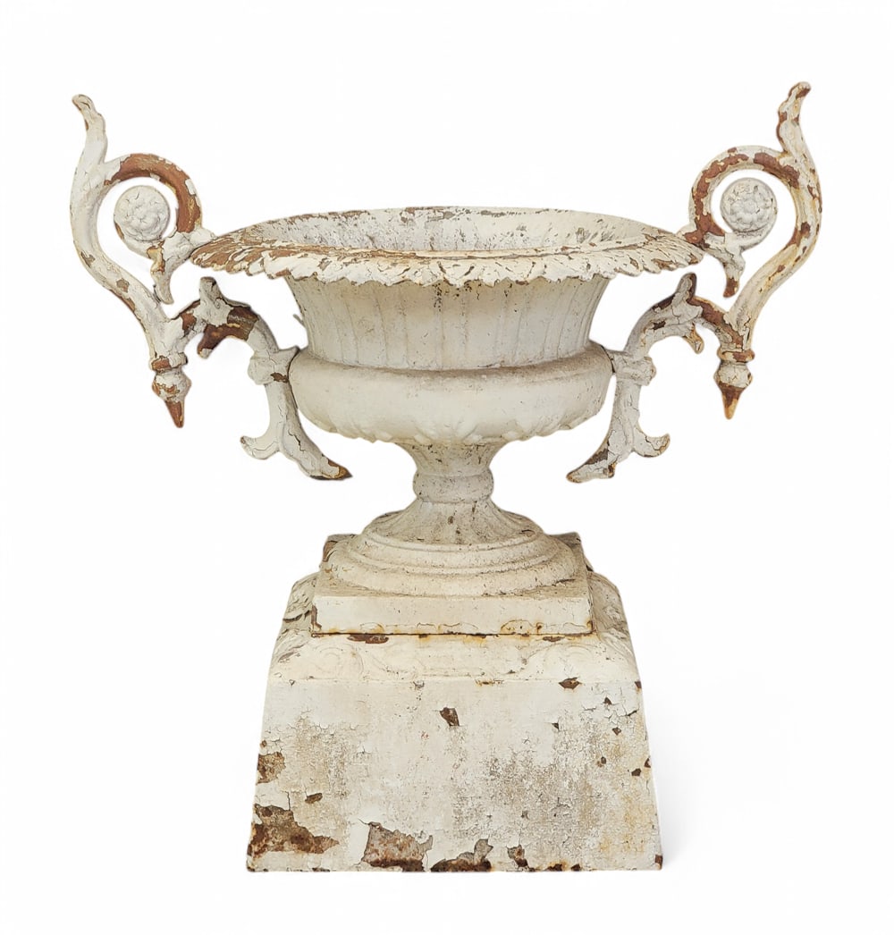 CAST-IRON URN: Worn mark appears to be for Kramer Brothers, Dayton, Ohio, late 19th century. Two-part urn with old white paint. 32" high. Provenance: Kemp collection, Belpre, Ohio.