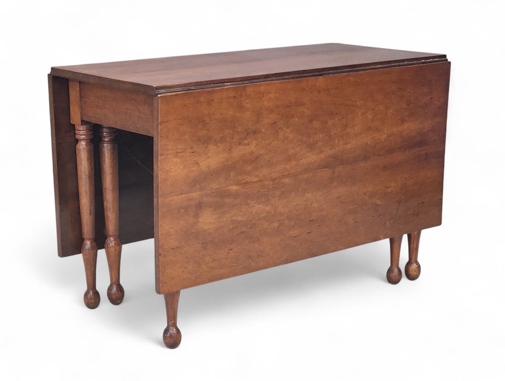 SHERATON SIX-LEG DROP-LEAF TABLE: American, 2nd quarter-19th century, cherry. Long leaves and six turned legs. 29" high, 44" wide, 21.5" deep (closed), 63" deep (open). Provenance: a western New York collection.
