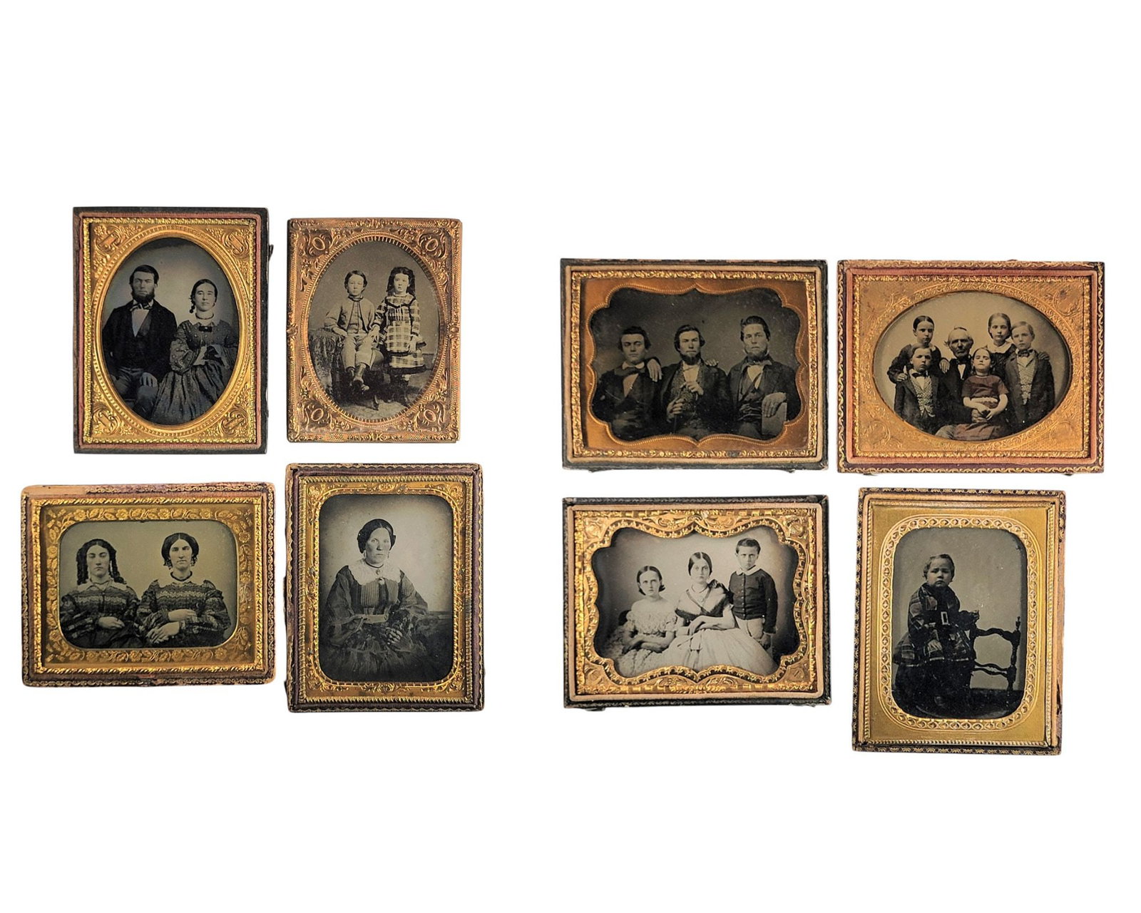 EIGHT QUARTER PLATE PHOTOGRAPHS: Includes ambrotypes and tintypes, and includes children and families. Provenance: The Collection of Dr. Virginia Gunn, Wooster, Ohio.