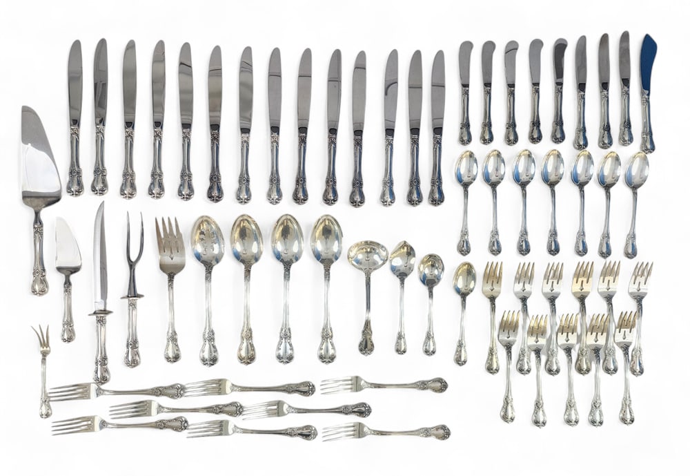 TOWLE OLD MASTER STERLING SILVER FLATWARE: 20th century. 63 pieces of sterling silver flatware and serving pieces in the "Old Master" pattern, introduced in 1942, includes: 14 knives, 8 individual butter knives, 8 dinner forks, 11 pierced sala