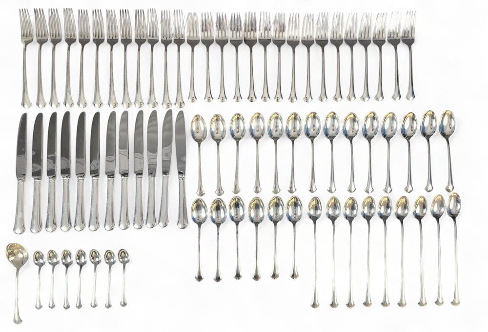 TOWLE CHIPPENDALE STERLING SILVER FLATWARE: 20th century. 110 pieces, including table knives, dinner forks, salad forks, teaspoons, butter knives, soup spoons, ice tea spoons, and various serving and other pieces. Total weight approx. 3150g (ex